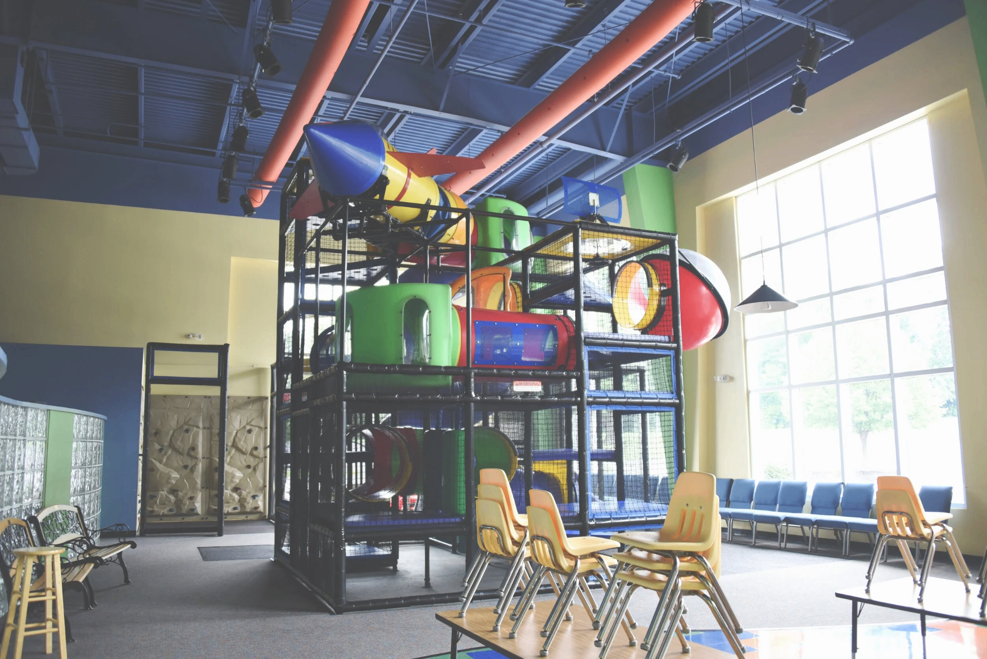 Central Park Playland β large indoor play structure with tunnels, slides and a climbing wall